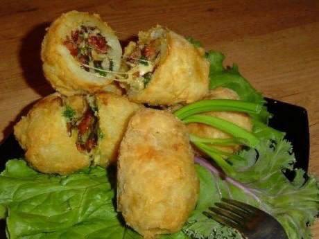 Картопля з начинкою з шинки та сиру