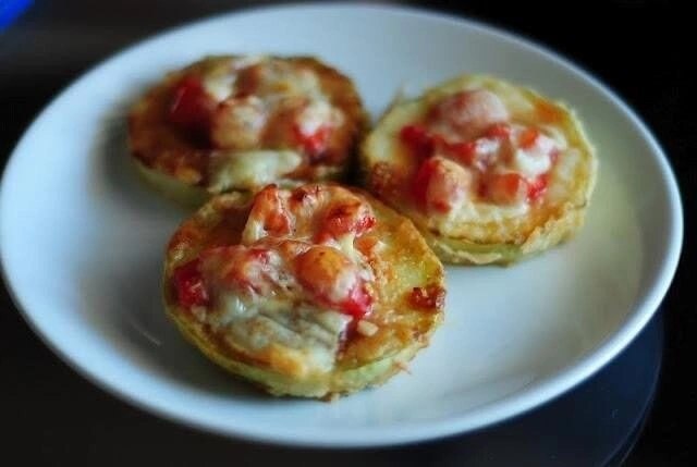 Кабачки з сиром та томатами